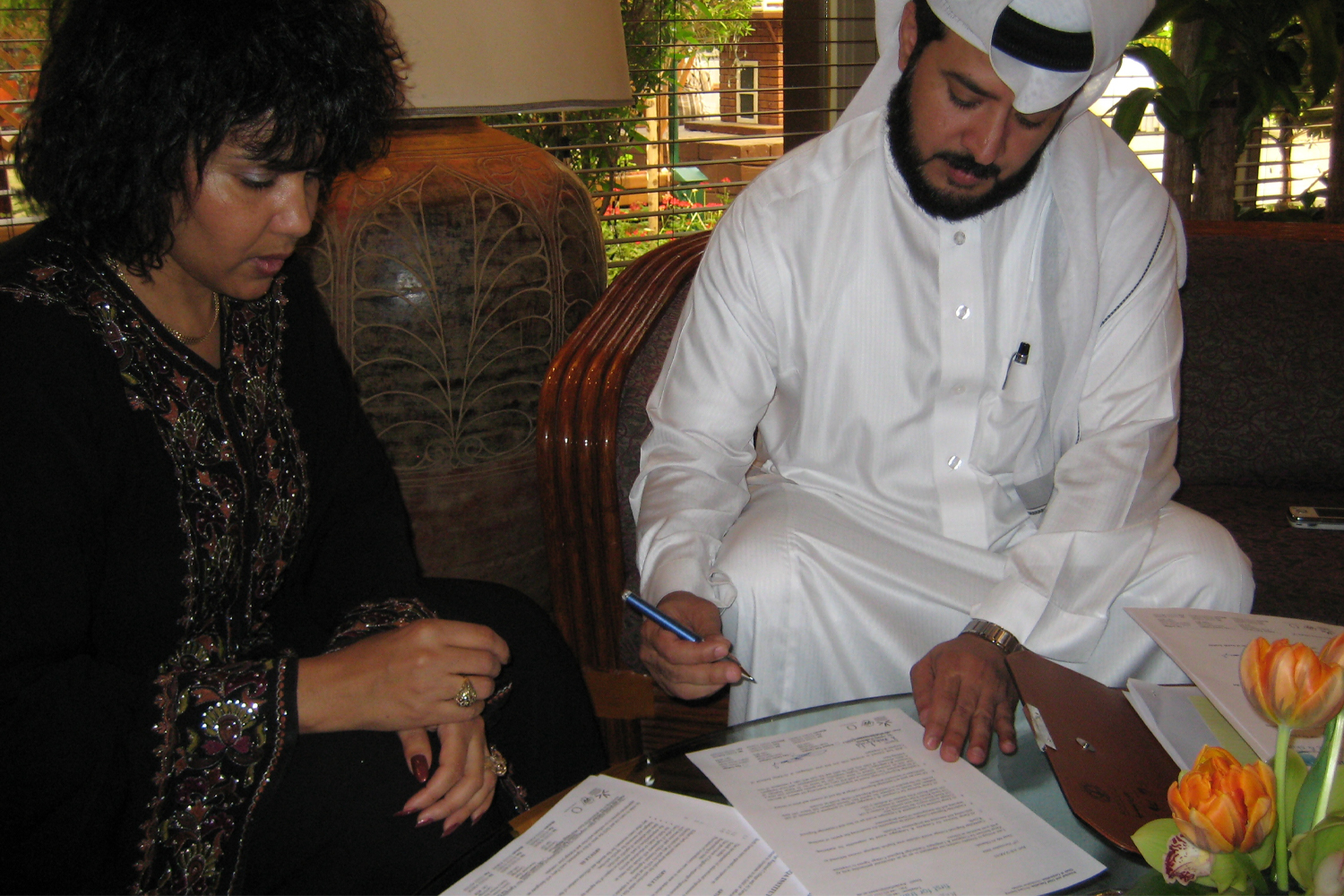 Signing Ag wityh AL Zarqa